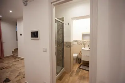 a bathroom with a shower and a toilet at Holiday House Annunziata 1 in Termini Imerese