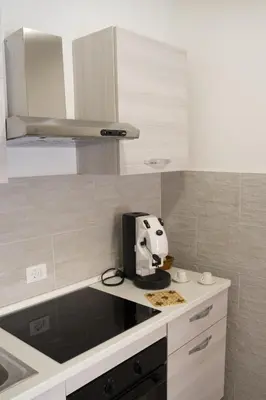 a kitchen with a mixer on a counter at Casa Verdi in Capaci