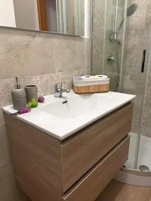 a bathroom with a sink and a shower at Casa Marì-Albergheria in Palermo's historic center in Palermo