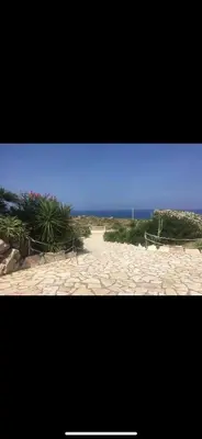 a picture of a beach with a blue sky at Vista mare 360 in Scopello