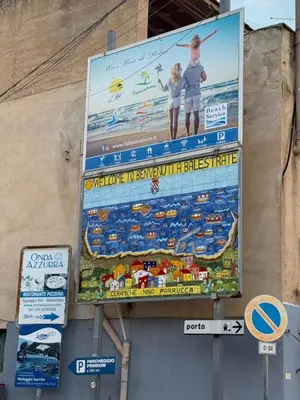 a large billboard on the side of a building at Dimora Anastasia - Alloggio nel cuore di Balestrate in Balestrate