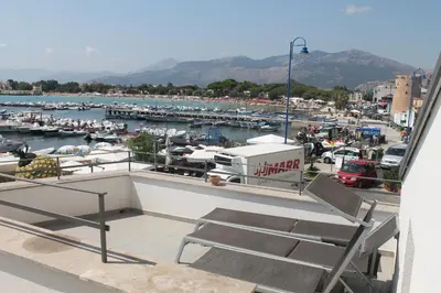 a view of a marina with boats in the water at b&b Simpaty in Mondello