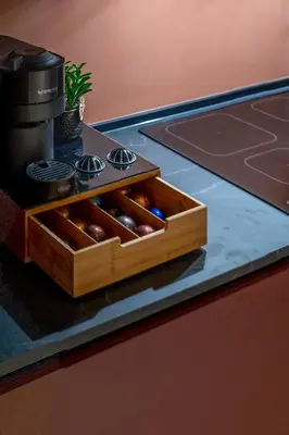 a wooden box on a counter with a coffee maker at Corallo - Cantunera Old Town Apartments in Palermo