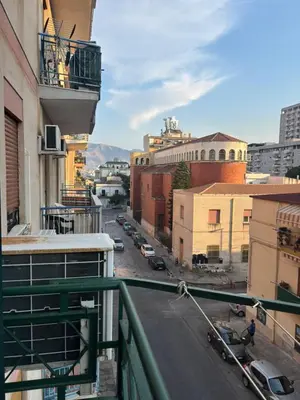 a view of a city street from a balcony at Alessandra guesting house - Palermo in Palermo