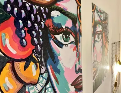 a painting of a woman with long hair at Casamori 2- nel cuore di Palermo, mercato Ballarò in Palermo