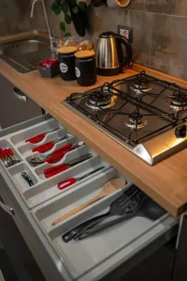 a stove top oven sitting under a kitchen counter at Il Palchetto in Palermo