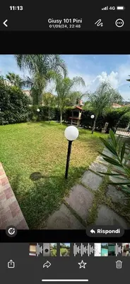 a screenshot of a picture of a frisbee in a yard at Villaggio 101 Pini in Buonfornello