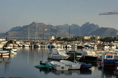 a bunch of boats are docked in a harbor at VFH La Rada Apartments in Santa Flavia