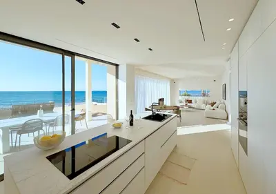 a kitchen with a view of the ocean at Solemar Sicilia - Villa Gloria in Ficarazzi