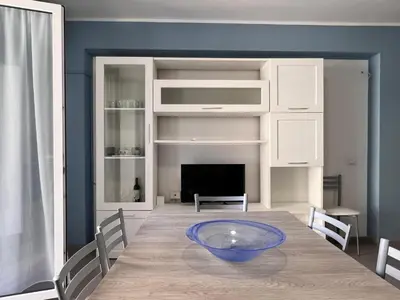 a dining room with a table with a bowl on it at M'AMA apartment 3 in Ficarazzi