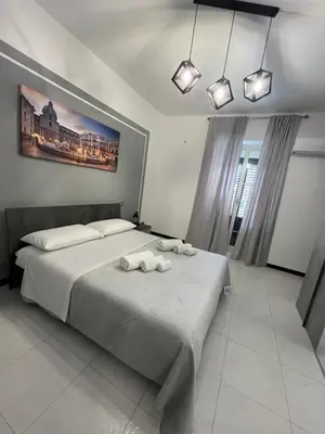 a bathroom sink with keco products sitting on it at D'Aversa Rooms in Marineo
