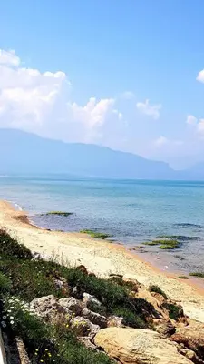 a sandy beach with the ocean in the background at Stanze del Mare in Balestrate