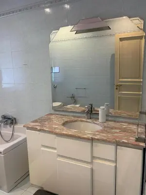 a bathroom with a sink and a mirror at Casaleoni5769 in Palermo