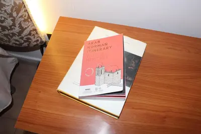 two books sitting on top of a table at Giacalone15 - EXCLUSIVE APARTMENT IN THE HISTORIC CENTER NEAR THE TEATRO MASSIMO in Palermo