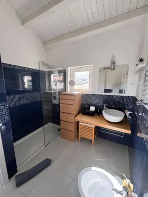 a bathroom with a sink and a shower and a tub at Dimora Stella Boutique in Alcamo
