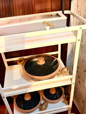 a shelf with a frying pan on it at La Casetta del Centro in Palermo
