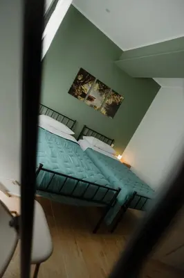 a view of a bedroom with a bed in a attic at Sarina's apartment in Palermo