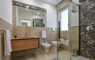 a bathroom with a sink and a toilet at Amazing Home In Trabia in Trabia
