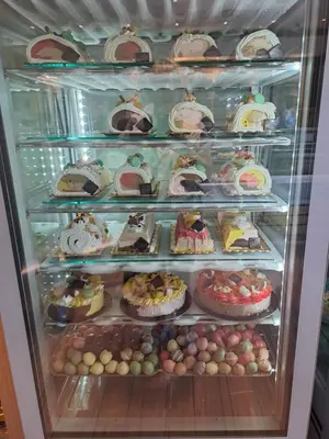 a refrigerator filled with lots of different types of food at ANGELA Rooms in Marineo