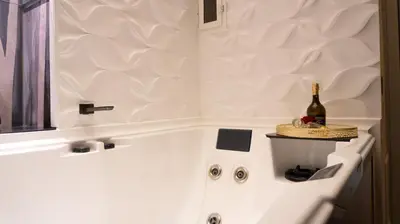 a white bowl on a counter in a bathroom at Algaria Sicilian Suites in Palermo