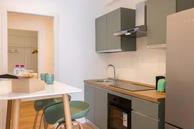 a small kitchen with a counter and a sink at Don Federico Apartment in Palermo