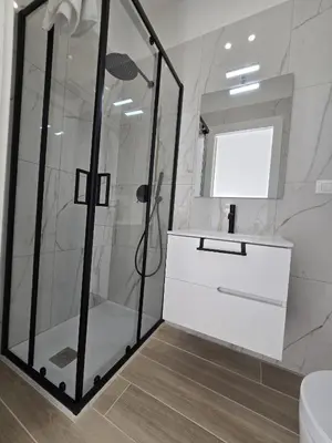 a bathroom with a shower and a sink at GiuAdel casa Palermo in Palermo