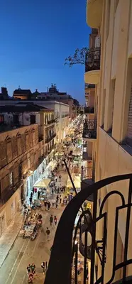 a view from a balcony of a city street at GiuAdel casa Palermo in Palermo