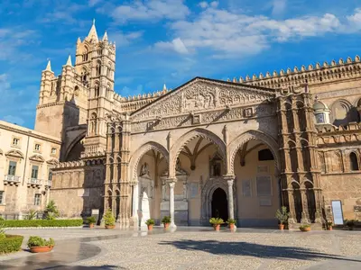 a large building with a tower and a cathedral at Donna Elisa by Holiday World in Carini