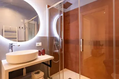 a bathroom with a sink and a shower at Don Federico - For Couple in Palermo