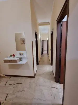 a hallway with a tile floor in a building at A casa dei nonni in Terrasini