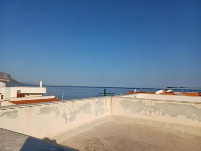 a view of the ocean from the roof of a building at Villa sul mare in Isola delle Femmine