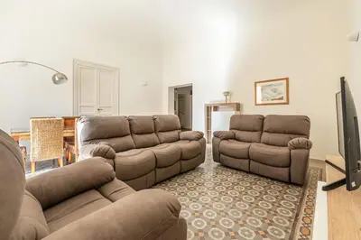 a living room with a couch and two couches at Central City Apartment by Wonderful Italy in Palermo