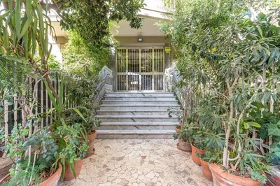 a building with a bunch of plants and stairs at Un Giardino Segreto a Palermo by Wonderful Italy in Palermo