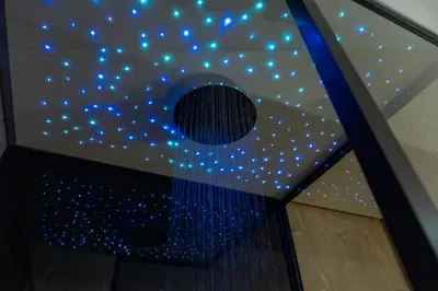 a room with a ceiling with blue lights at Isidoro Luxury Suites in Palermo