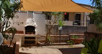 a patio with an outdoor oven in a house at Villetta Nuccia in San Vito lo Capo