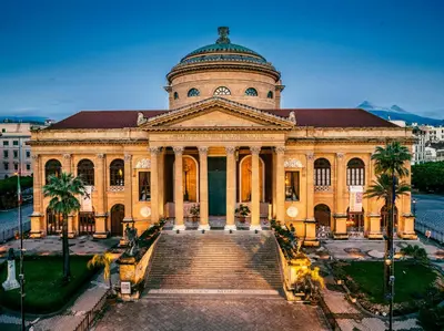 a large building with a staircase in front of it at La Dimora di Icaro - near the sea, the Airport and Palermo in Carini