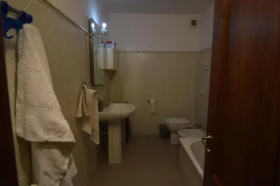 a bathroom with a sink and a toilet at Carlita's Home in centro storico a Palermo in Palermo
