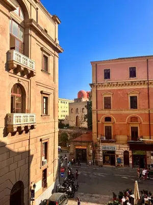 a view of a street in a city with buildings at Casa 3 Cupole, Historic Soul and Contemporary Design in Palermo