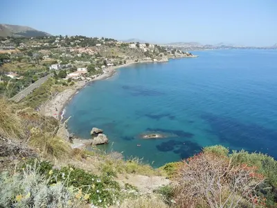 a view of a beach from a hill at Hotel Villa Mare in Altavilla Milicia