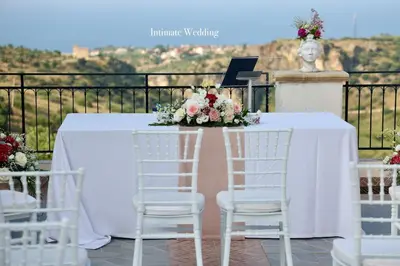 an archway with an open door with a view of the ocean at Tenute Armani The Castle Live an Experience in Altavilla Milicia