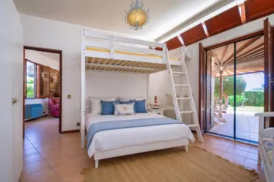 a patio with a view of the ocean from a house at LeSicilien - Tilde Sunset Bay Villa in Carini