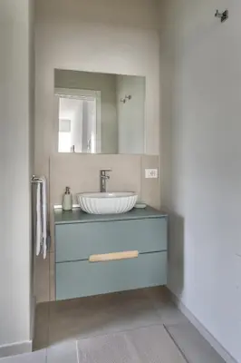 a bathroom with a sink and a mirror at Case libertà in Palermo
