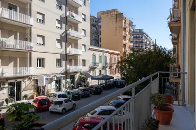 a view of a city street with parked cars at GuestHost - Palermo Roomy and Modern Apartment in Palermo