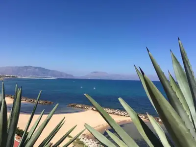 a view of the beach and the ocean at Apartment Villa Gina in Trappeto by Interhome in Trappeto