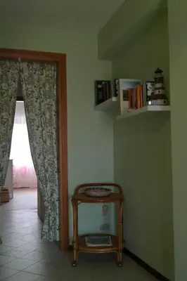 a room with a door and a table and a window at Holiday Home Villa Aliotis 200m vom Meer entfernt by Interhome in Alcamo Marina