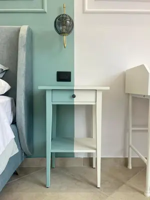 a bedroom with a bed and a tub and a sink at Palermo City Garden Lux Suites in Palermo