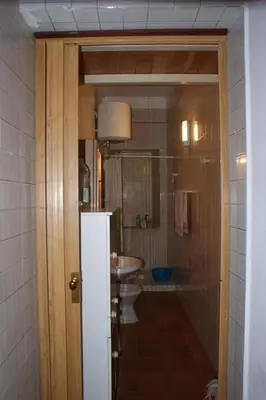 a bathroom with a sink and a toilet and a shower at Apartment Wohnung mit Wasserblick by Interhome in Castellammare del Golfo