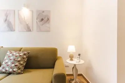 a plant sitting on a shelf in a room at Linfa Suite - Casuzza 276 in Palermo