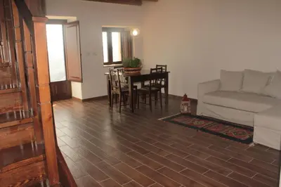 a living room with a couch and a table at Agriturismo Masseria Castellana in Monreale