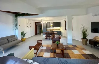 a living room with a couch and a table at Casa Manzella Apartments in Cinisi